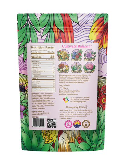 A stand-up pouch of BioBru Bloom blend mushroom drink shown from the back, featuring a colorful botanical illustration with green leaves, purple and orange flowers, and a white nutrition facts label.
